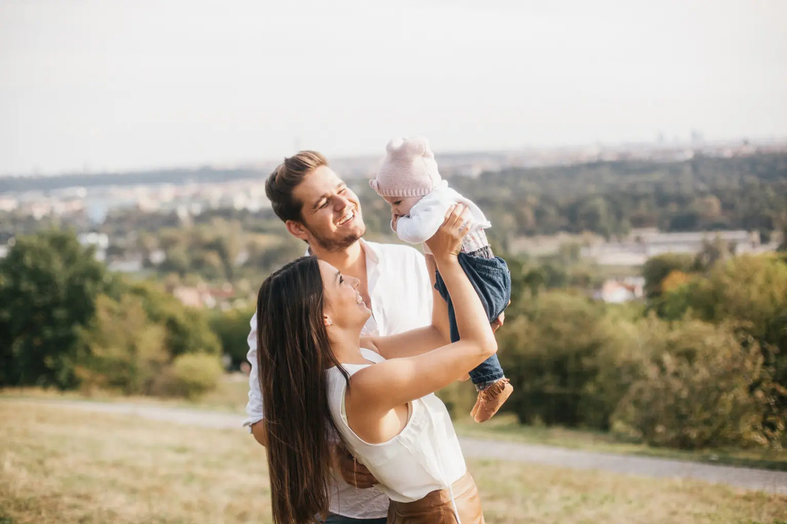 pareja con bebe feliz, noris insurance